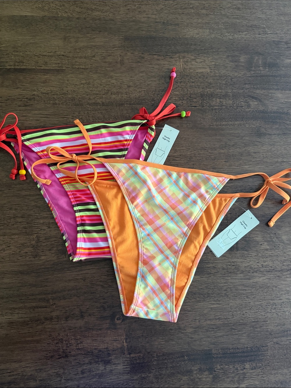 2 No Boundaries cheeky high leg side tie bikini bottoms
